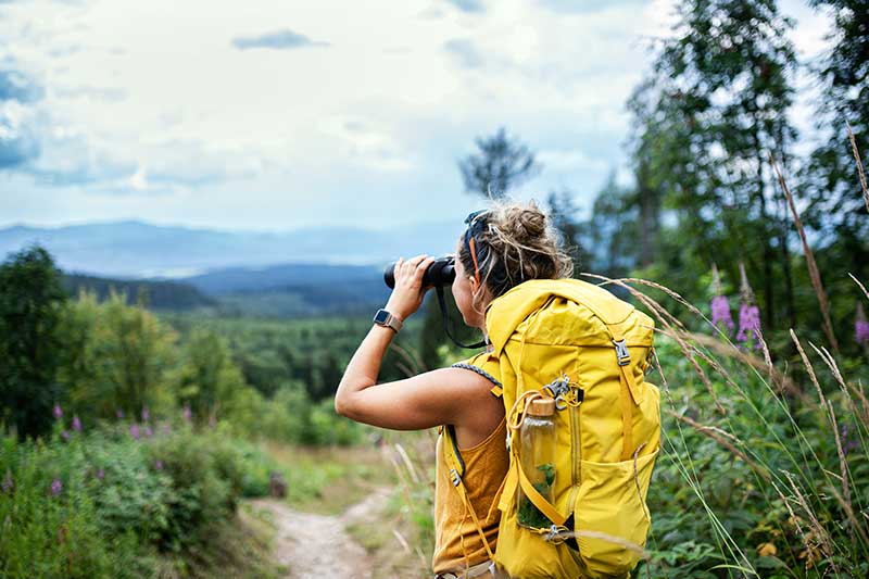 Woman Wearing A Backpack