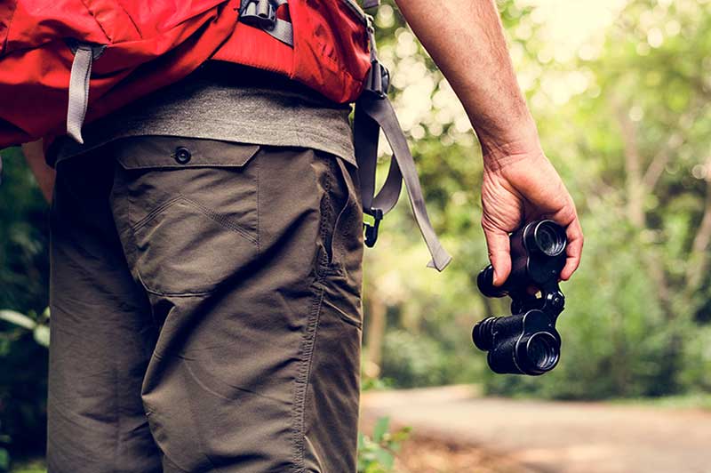 Man Holiding Binoculars